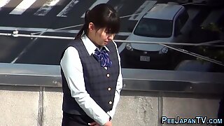 Asian lady pisses herself