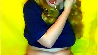 Pretty woman Masturbates with a Lollipop
