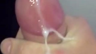 Massive cumshot all over cock in slow motion