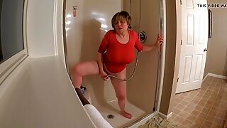 60 Plus GILF gets off in wet t-shirt
