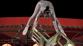 GORGEOUS CHINESE GIRL PERFORMING DEATH DEFYING STUNT